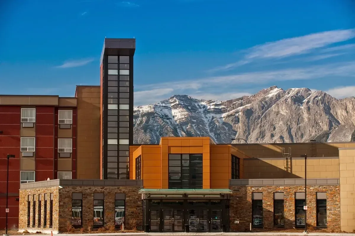 Mountain resort architecture against ridgeline